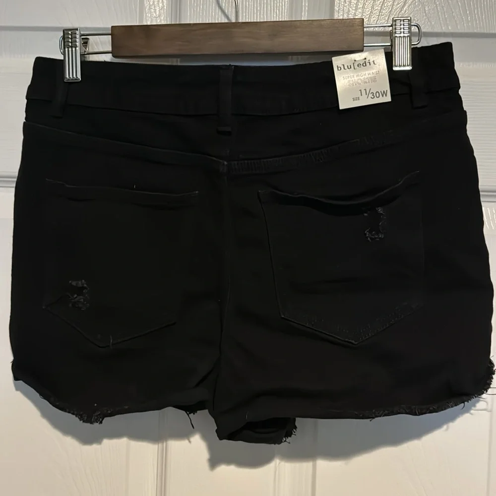 Distressed denim shorts
